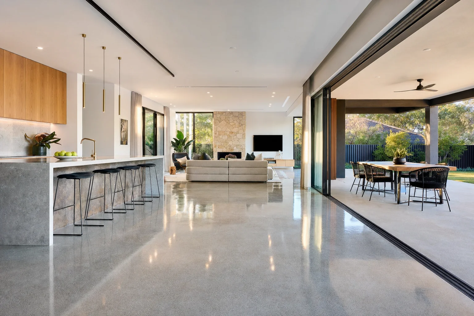 Polished concrete floor with a high-gloss finish in a modern Perth living area