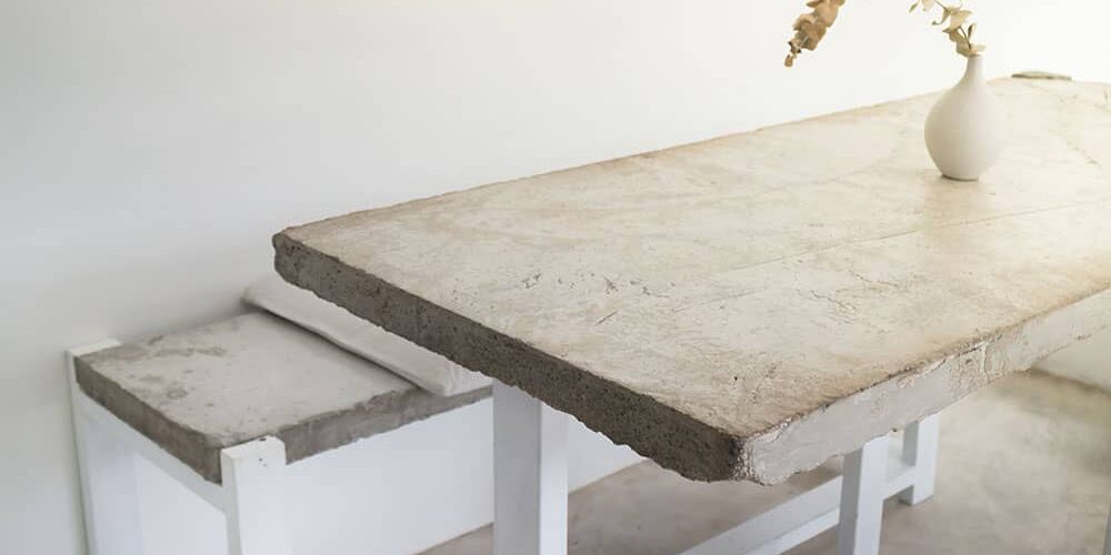 indoor concrete dining table and bench